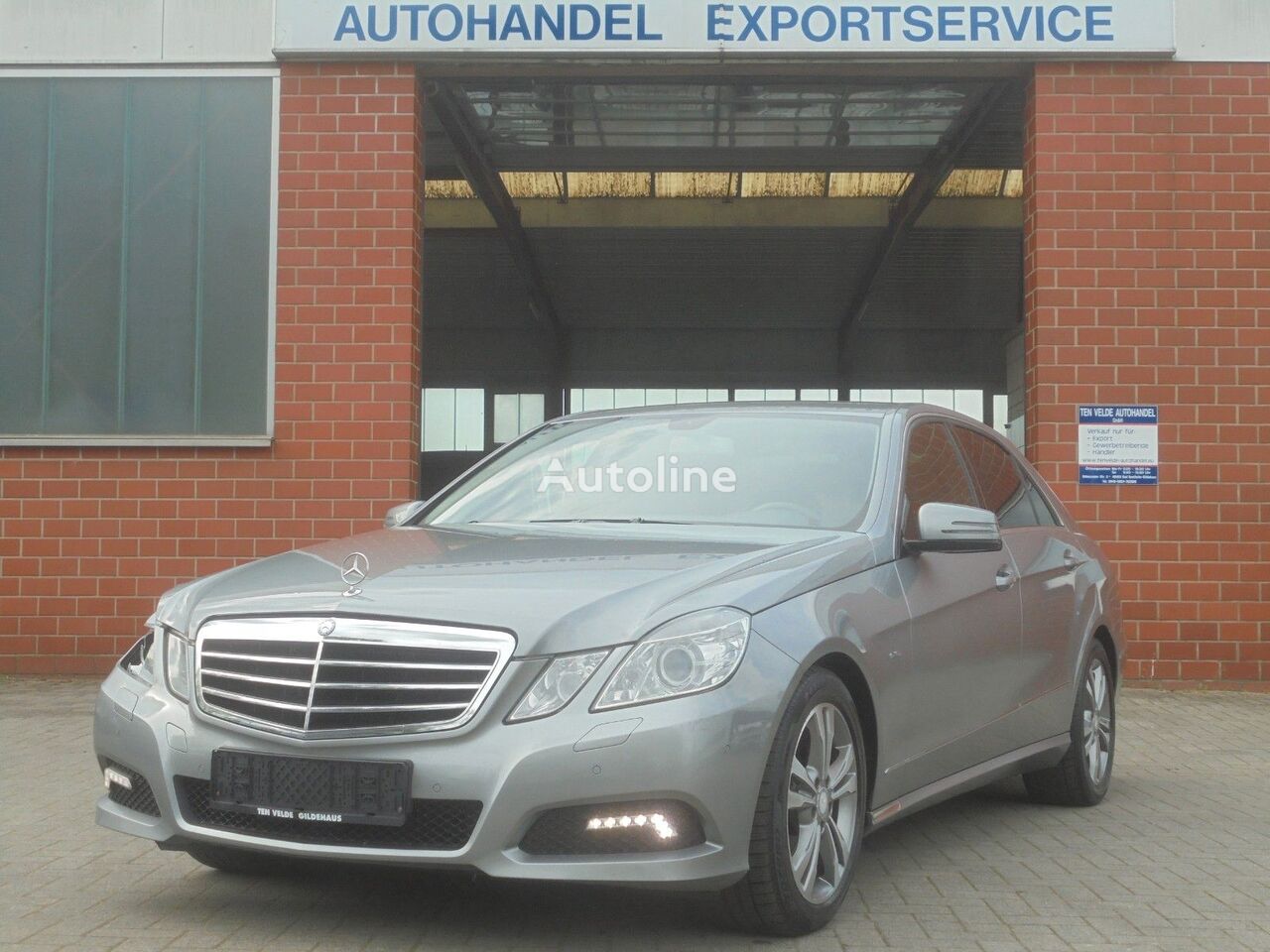 damaged Mercedes-Benz E 220  sedan